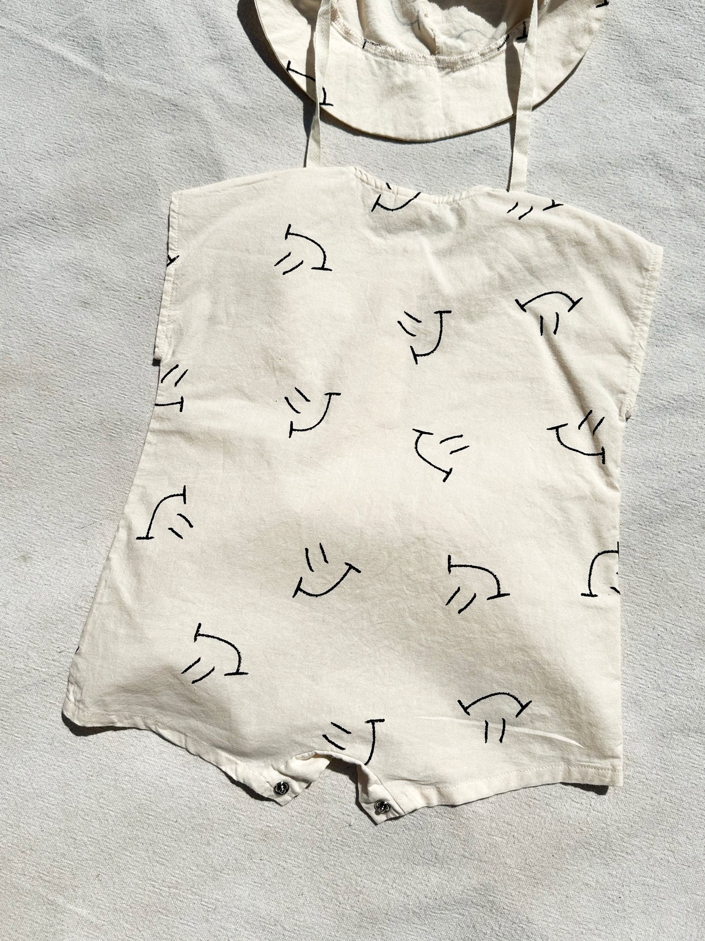 Smiley Onesie in Vintage White